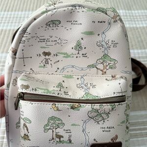 Loungefly Winnie the Pooh Cream and Green Printed Backpack
